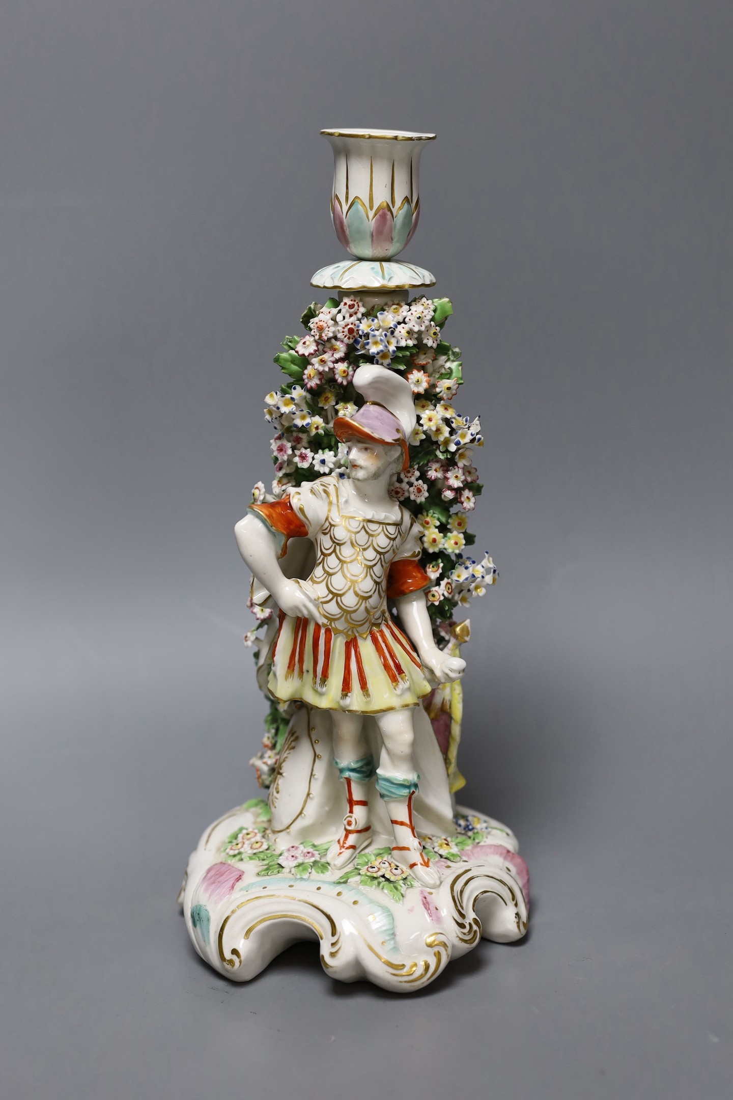 A Derby male bocage figural candlestick, c.1770, 26 cms high